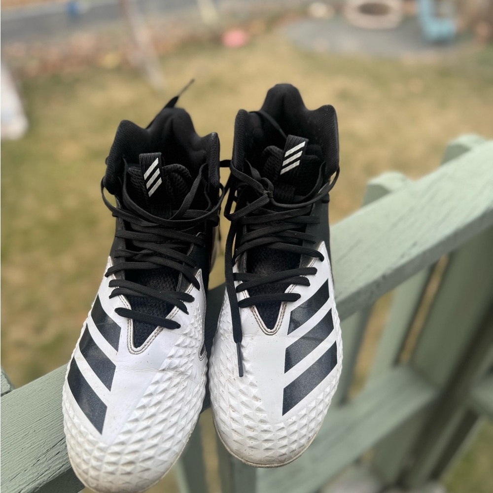 Like new, Adidas men’s Black and White football cleats Sports shoes 👟